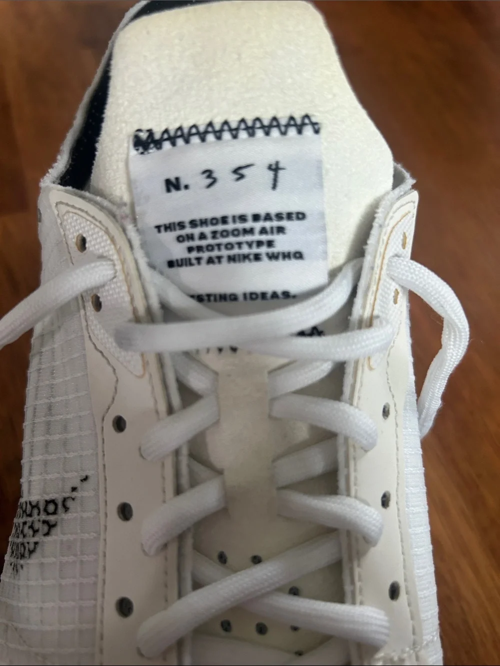 Nike Men’s Zoom Air Prototype - White Sneakers with Black Swoosh Detail